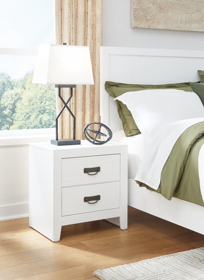 Binterglen California King Panel Bed, Dresser, Mirror, Chest and Nightstand